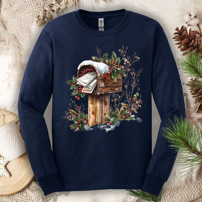 Navy long sleeve tee with a watercolor wooden mailbox full of letters to Santa, snow, and holly.