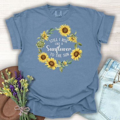 Blue Jean cotton t-shirt with "Still I Rise Like a Sunflower to the Sun" in a sunflower wreath.
