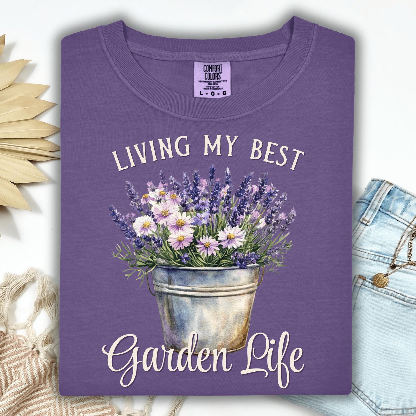 Grape "Living My Best Garden Life" t-shirt with a bucket of lavender and daisies.