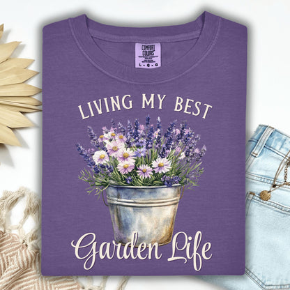 Grape "Living My Best Garden Life" t-shirt with a bucket of lavender and daisies.