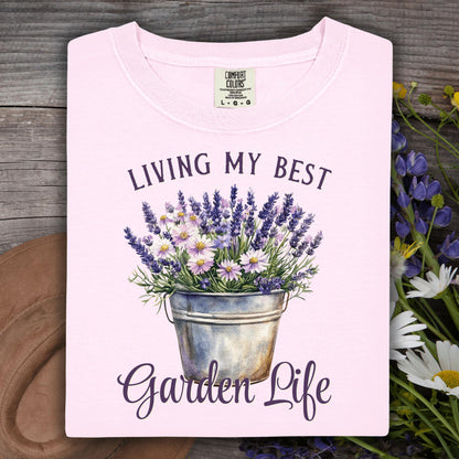 Folded Blossom pink "Living My Best Garden Life" t-shirt with a lavender and daisy bucket graphic.