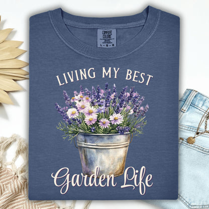 Denim blue "Living My Best Garden Life" t-shirt with a watercolor bucket of lavender and daisies.