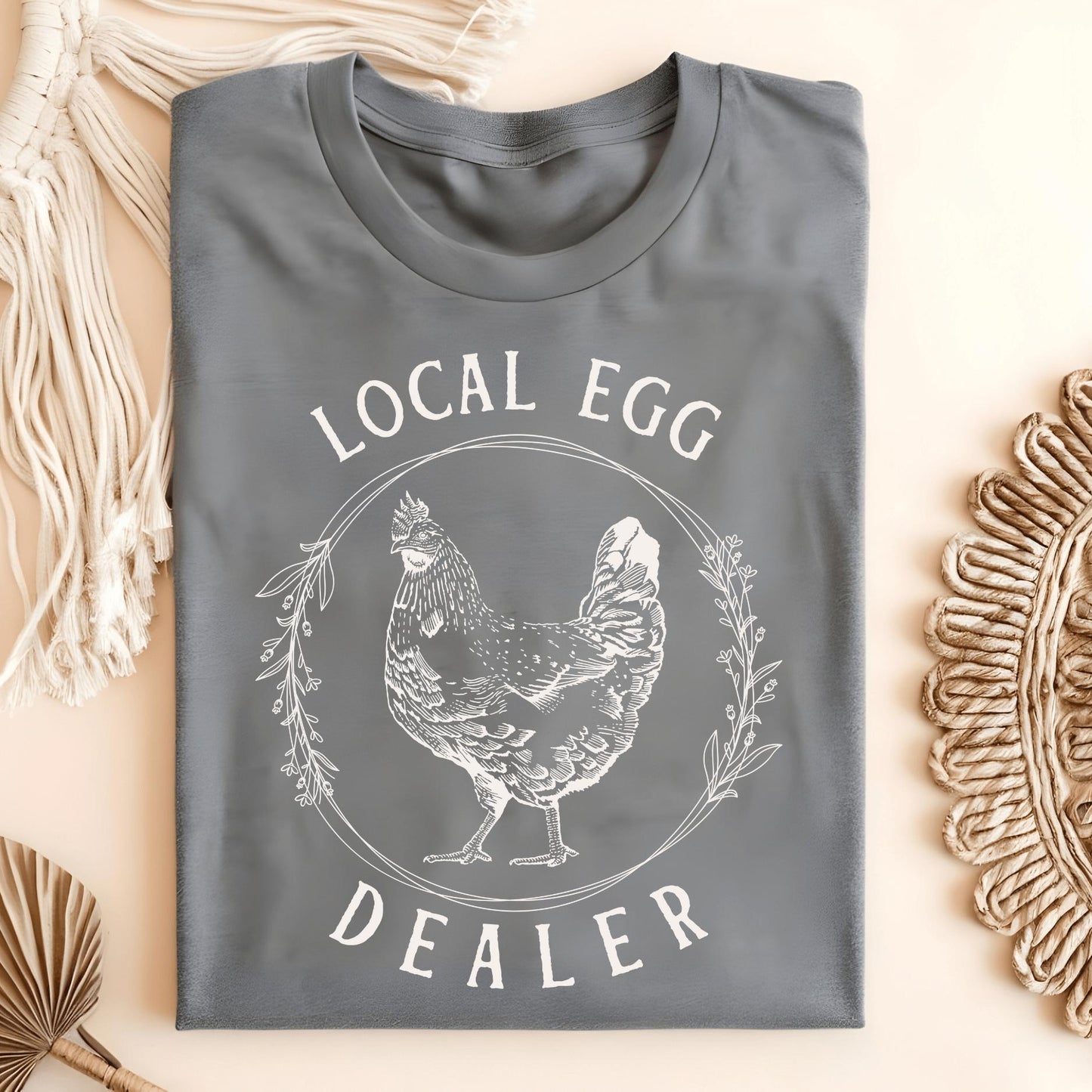 Graphite Heather S Local Egg Dealer t-shirt with a vintage hen and floral wreath design.