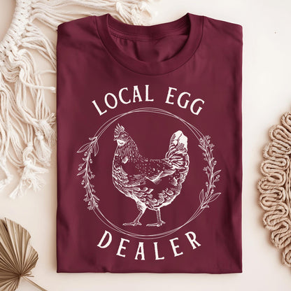 Maroon Local Egg Dealer T-shirt, size S, with a vintage hen and floral wreath design on heavyweight cotton.