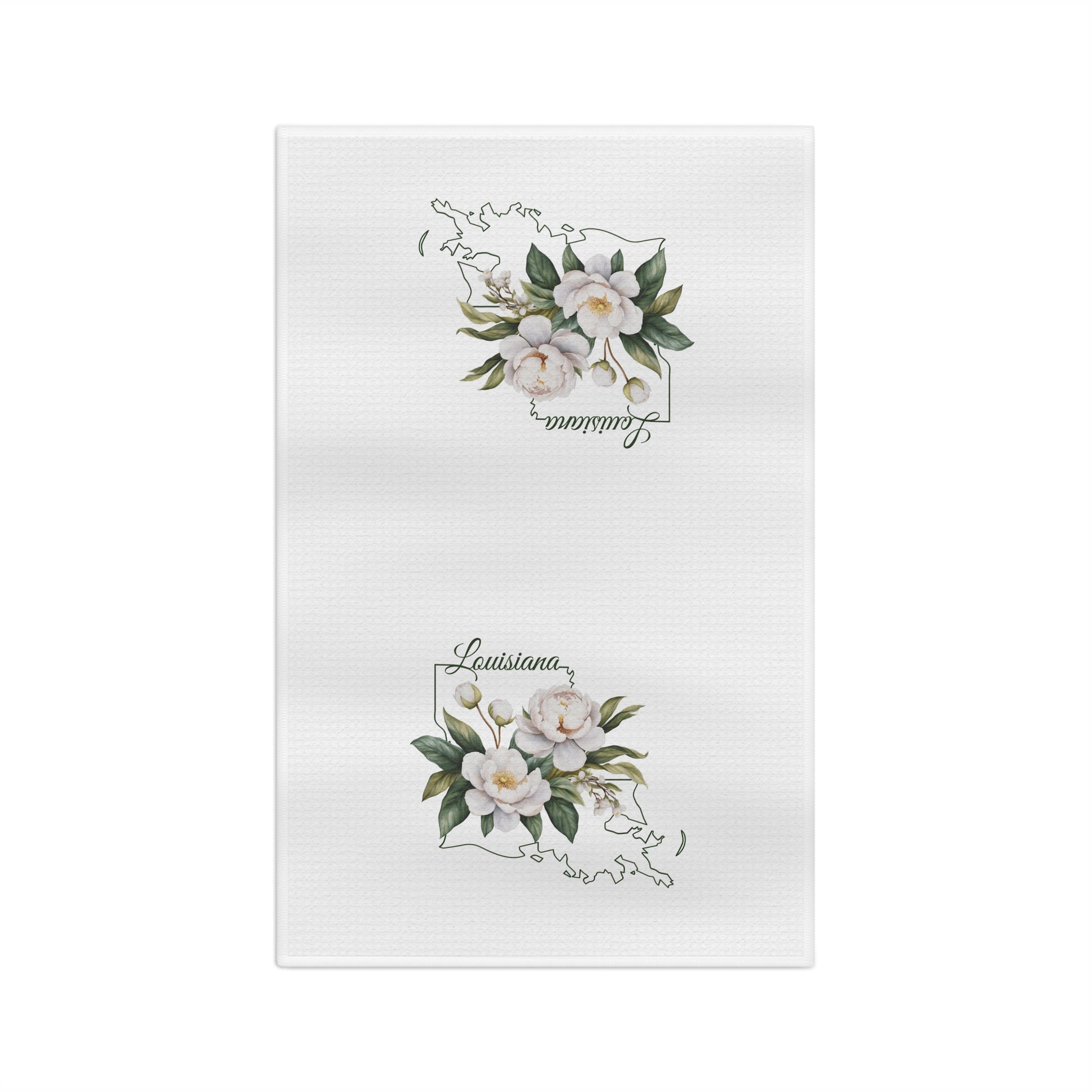 White microfiber tea towel with hand-drawn magnolias and "Louisiana" text over a state outline.