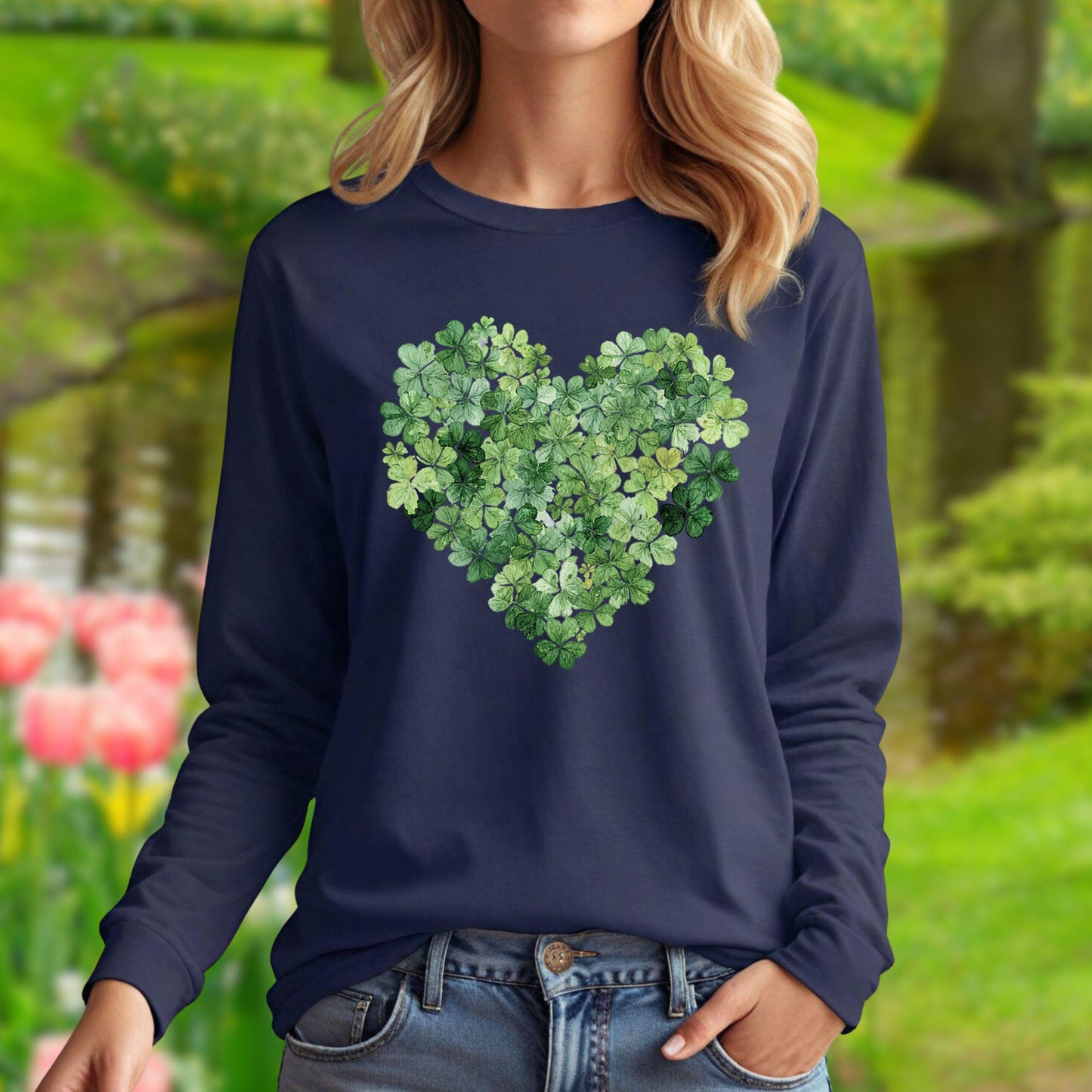 Navy long-sleeve tee featuring a heart design made of green clover leaves.