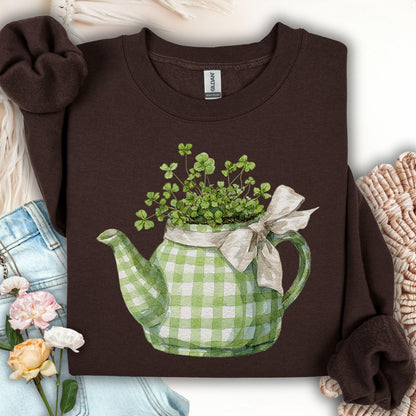 Brown sweatshirt with a green teapot and clover design on a white background