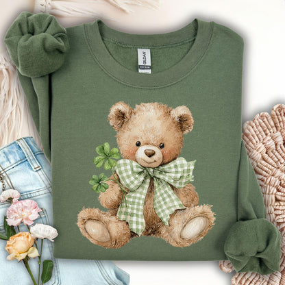 Military Green S sweatshirt with a watercolor teddy bear holding shamrocks and wearing a green gingham bow.