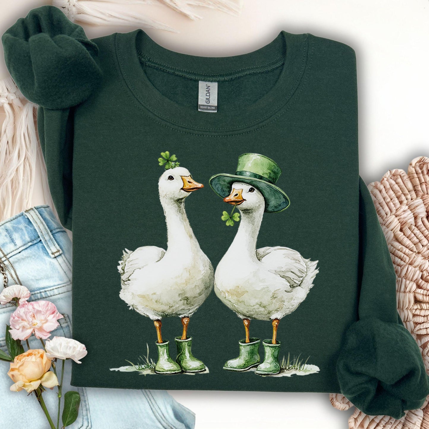Forest Green sweatshirt with two anthropomorphic geese in St. Patrick's Day attire and green boots.