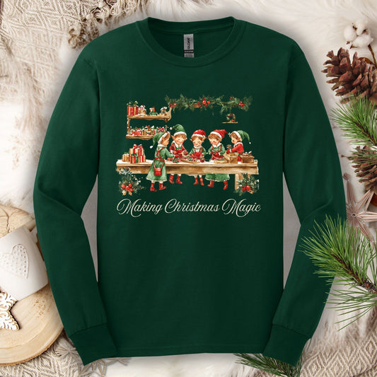Forest Green long sleeve tee with vintage Santa's workshop elves and "Making Christmas Magic" text.