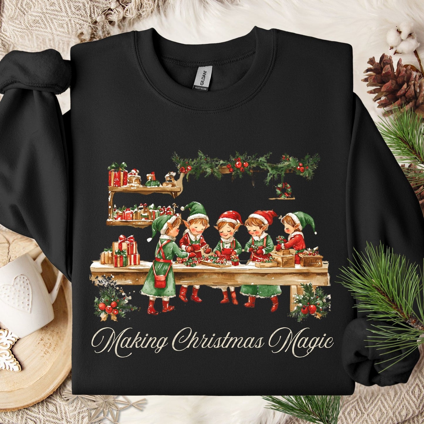 Black S sweatshirt with vintage Santa workshop, elves making Christmas magic, and festive decor.