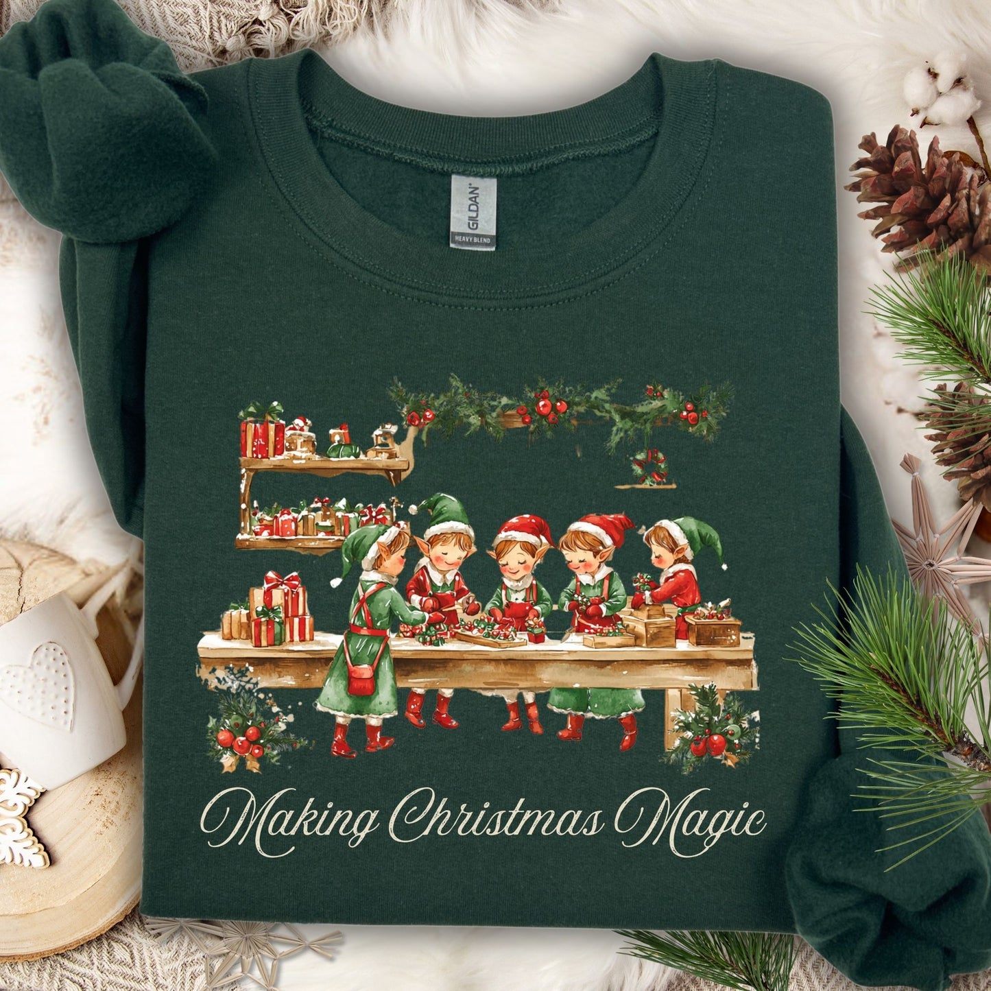 Forest Green S sweatshirt with vintage Santa's workshop, elves, and "Making Christmas Magic" design.