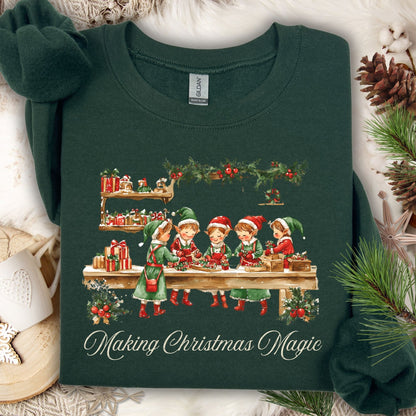 Forest Green S sweatshirt with vintage Santa's workshop, elves, and "Making Christmas Magic" design.