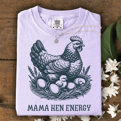 Orchid Comfort Colors t-shirt with vintage hen, chicks, eggs, and "Mama Hen Energy" text.