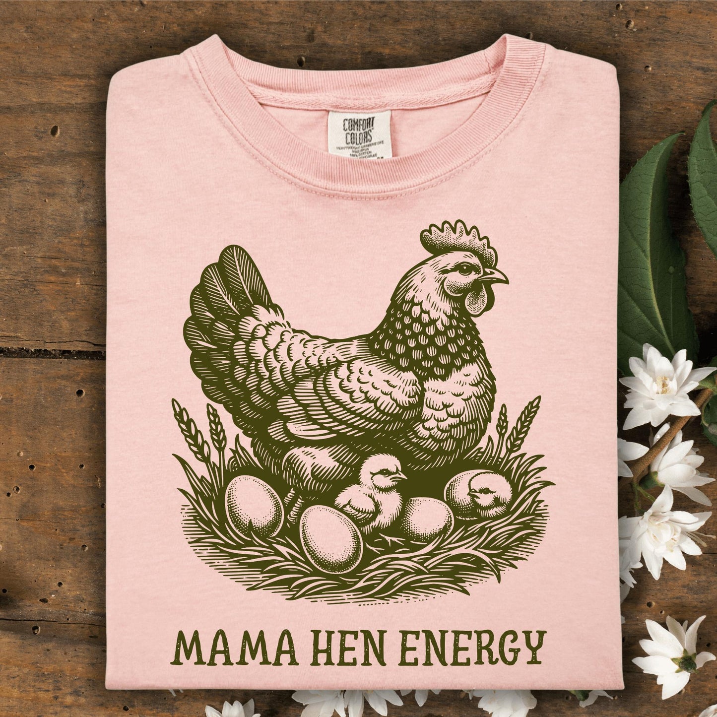 Peachy Comfort Colors t-shirt with a vintage hen, chicks, eggs, and "Mama Hen Energy" text.