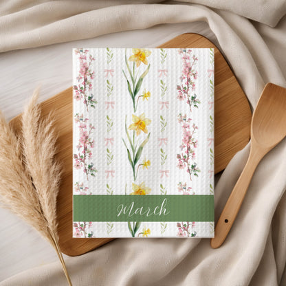 March Birth Month Flower Art Print with daffodils and cherry blossoms on a waffle-textured background.