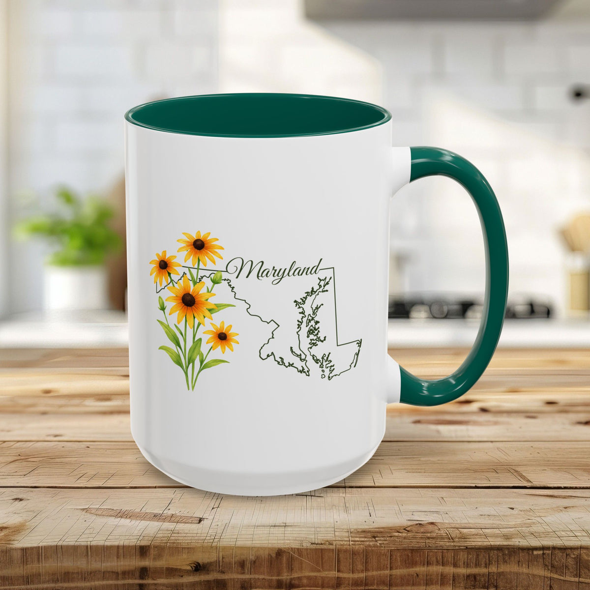 15oz white ceramic mug with green handle and interior, featuring Black Eyed Susan flowers and a Maryland state outline.