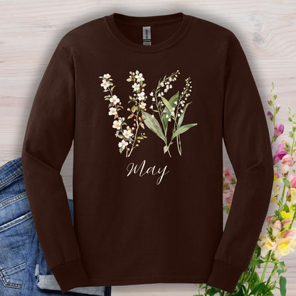 Dark chocolate long sleeve tee with watercolor lily of the valley, hawthorn blossoms, and "May" script.