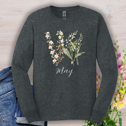 Dark heather long sleeve tee with watercolor lily of the valley, hawthorn blossoms, and "May" script.