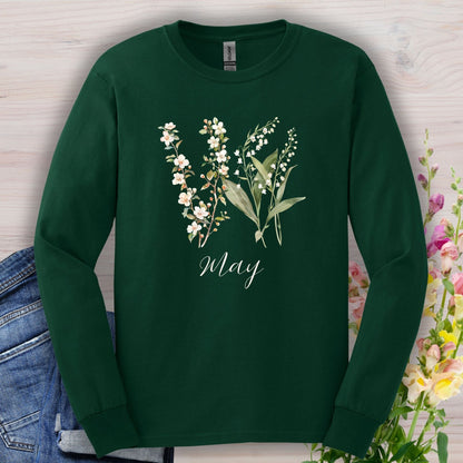 Forest Green long sleeve tee with watercolor lily of the valley, hawthorn blossoms, and "May" script.