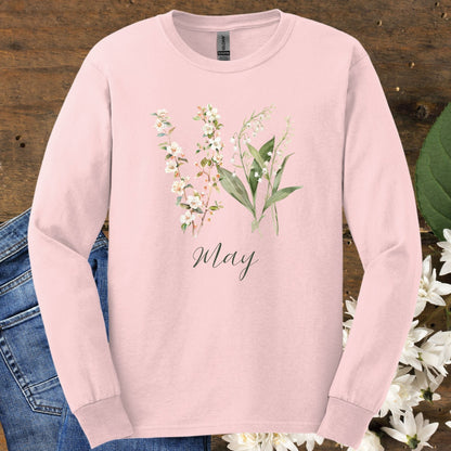 Light pink long sleeve tee with watercolor lily of the valley, hawthorn blossoms, and "May" script.