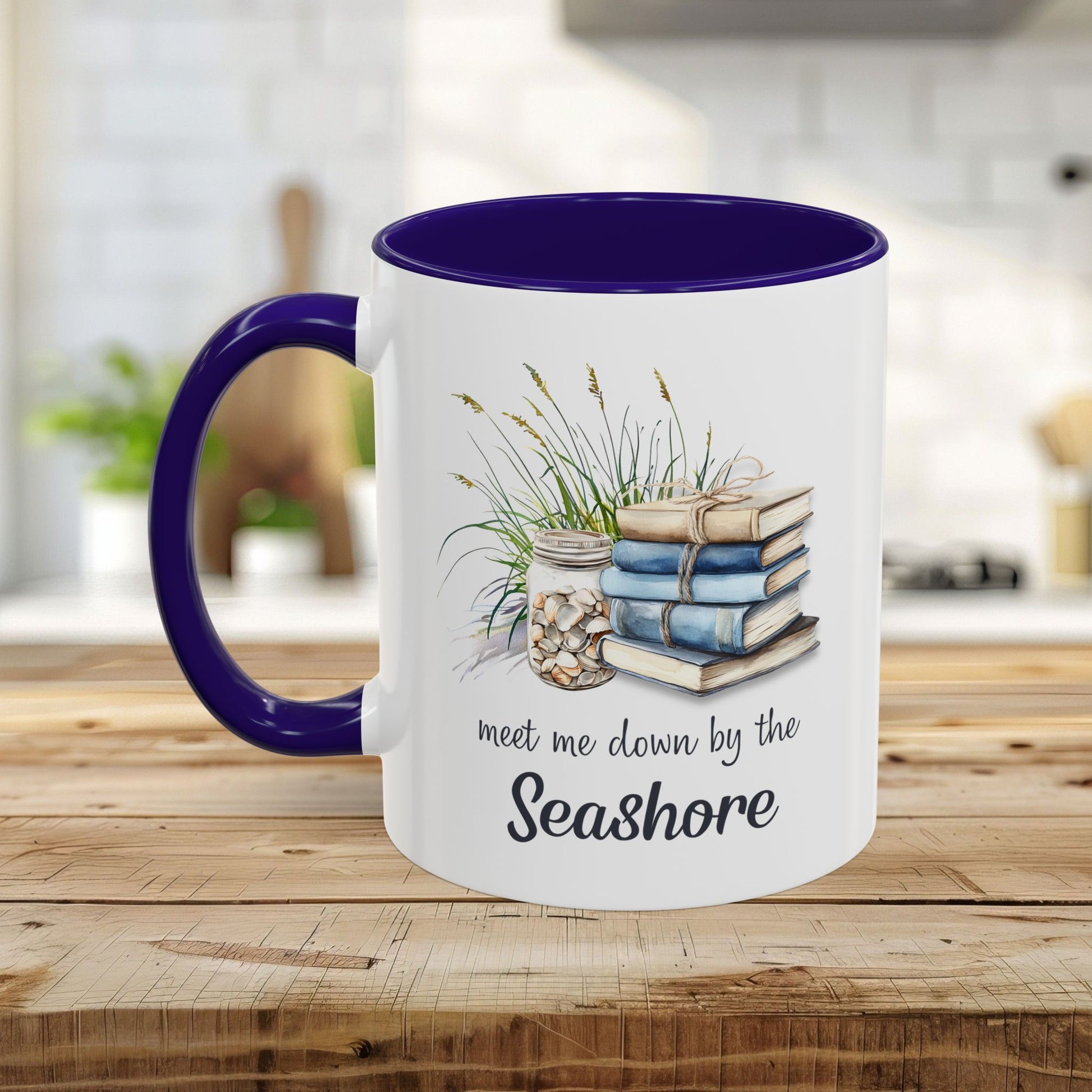 White ceramic mug with purple interior and handle, featuring watercolor art of stacked books, beach grasses, and shells.