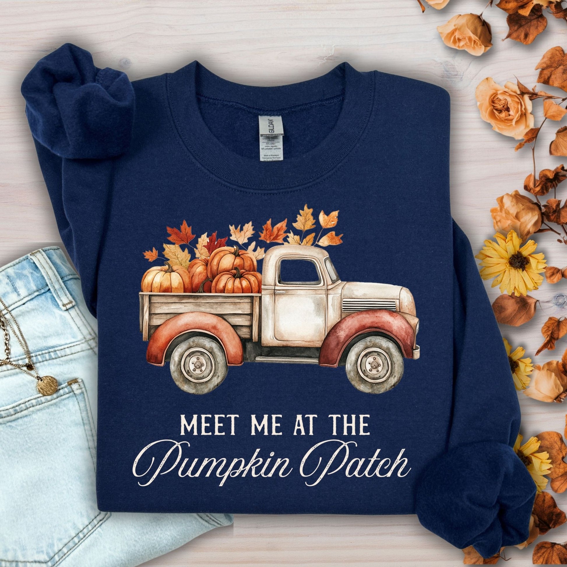 Navy "Meet Me at the Pumpkin Patch" sweatshirt with vintage truck, pumpkins, and autumn florals.