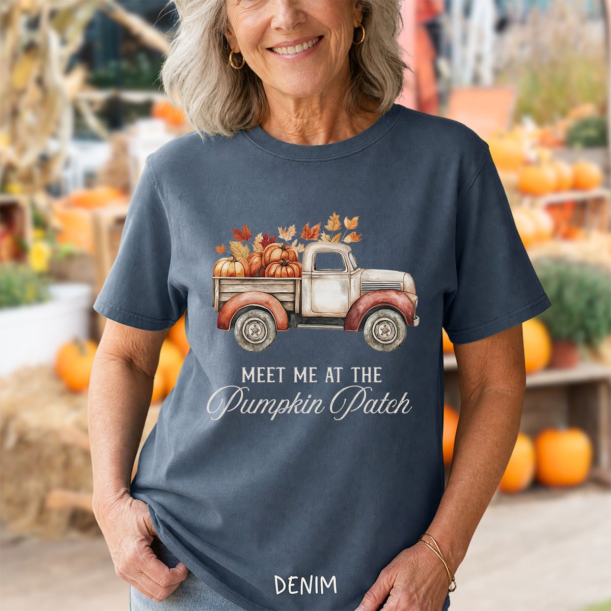 Denim blue cotton t-shirt featuring a watercolor vintage truck filled with pumpkins and autumn leaves, printed with fall text.