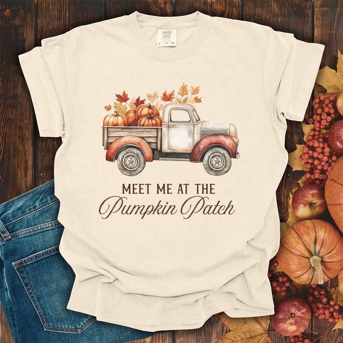 Ivory relaxed-fit cotton t-shirt featuring a vintage truck with pumpkins and the text Meet Me at the Pumpkin Patch.