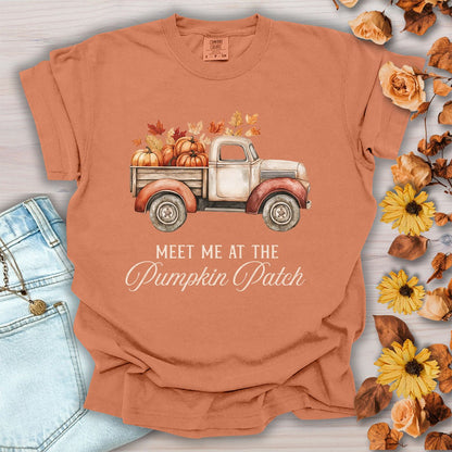 Yam-colored cotton t-shirt featuring a vintage truck with pumpkins and the text Meet Me at the Pumpkin Patch, size small.