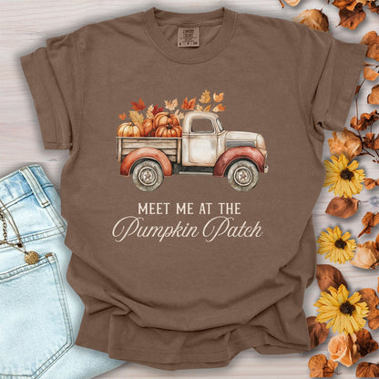 Espresso garment-dyed cotton t-shirt featuring a watercolor vintage truck with pumpkins and autumn leaves graphic.