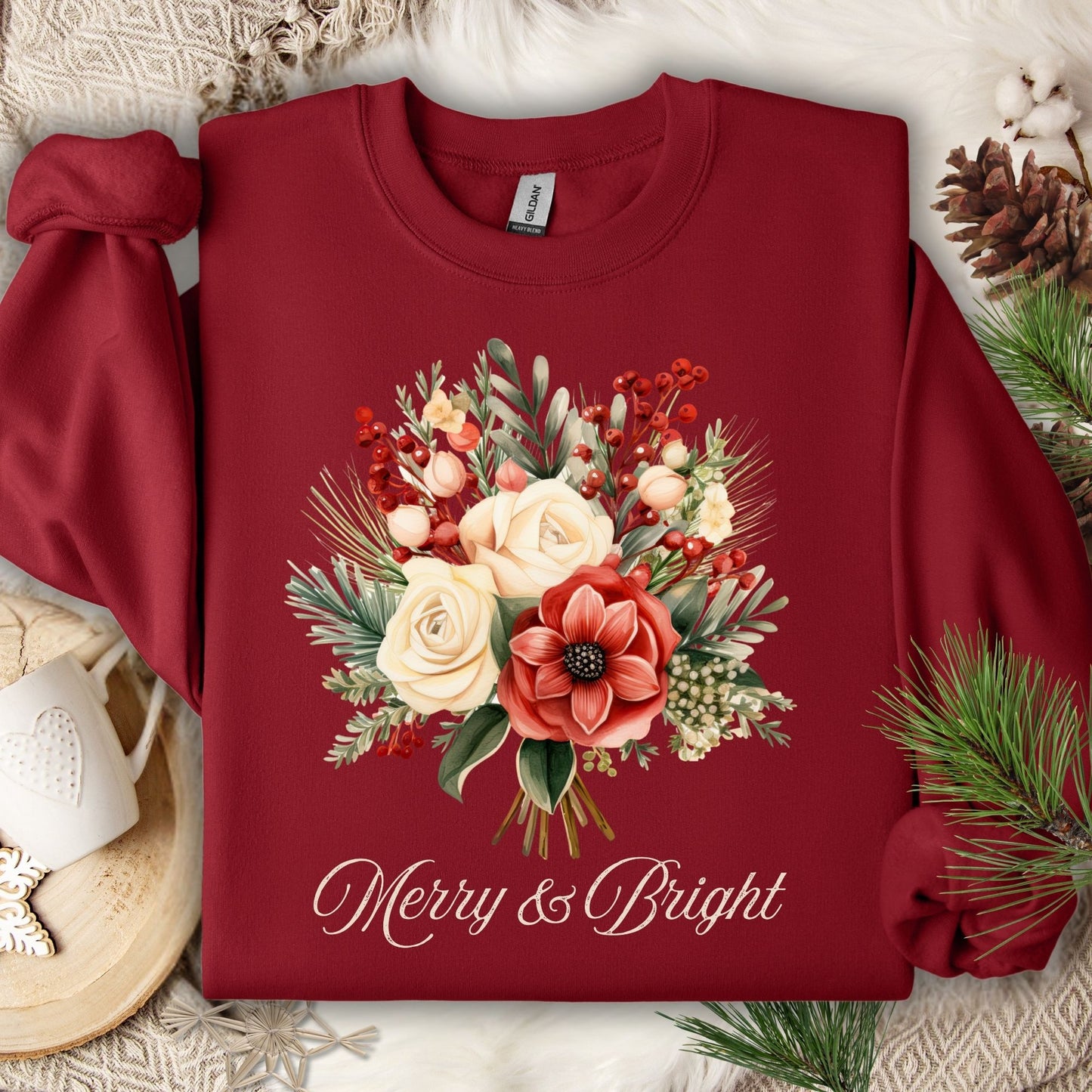Garnet Gildan sweatshirt with vintage poinsettia, white rose bouquet, and "Merry & Bright" text.