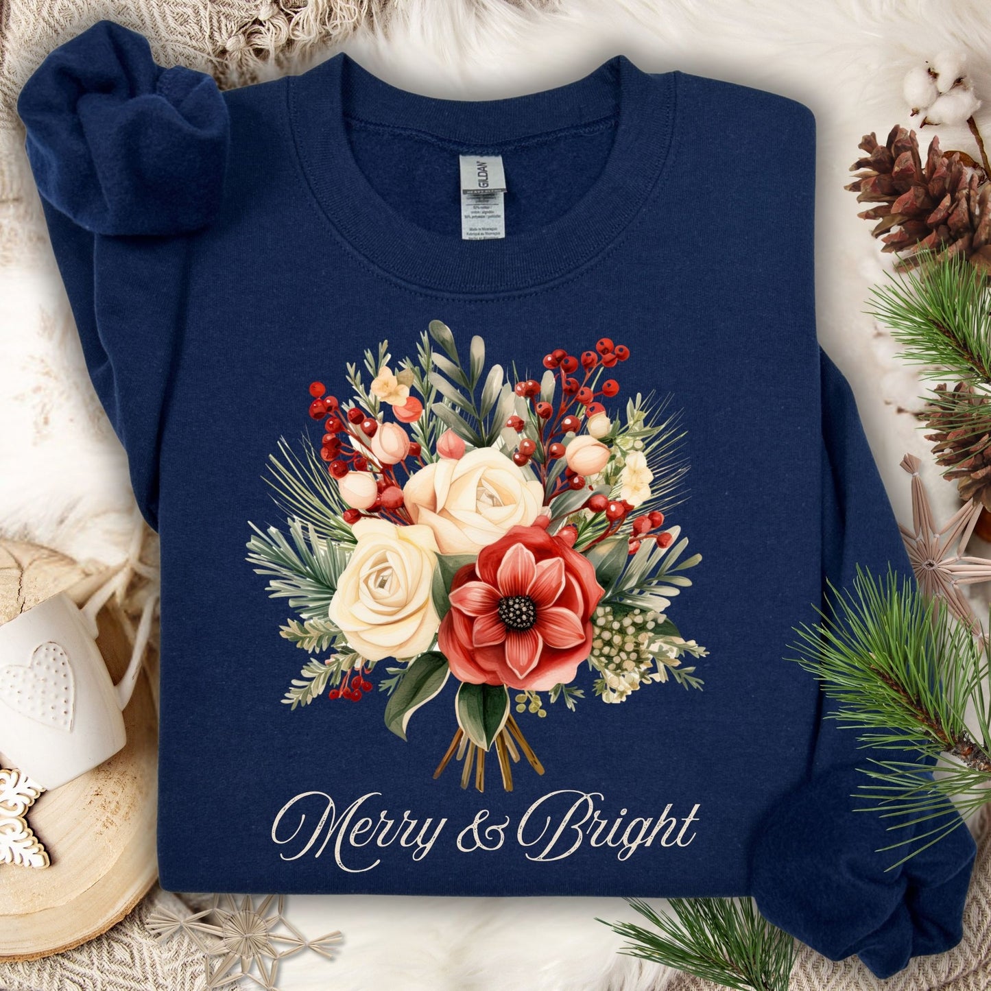 Navy Gildan sweatshirt with vintage poinsettia and rose bouquet, "Merry & Bright" text, and holiday foliage.