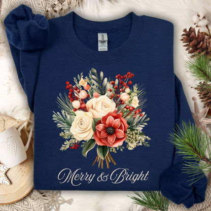 Navy Gildan sweatshirt with vintage poinsettia and rose bouquet, "Merry & Bright" text, and holiday foliage.
