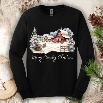 Black Gildan sweatshirt with a watercolor country Christmas scene featuring a red barn, snow, evergreens, and "Merry Country Christmas.