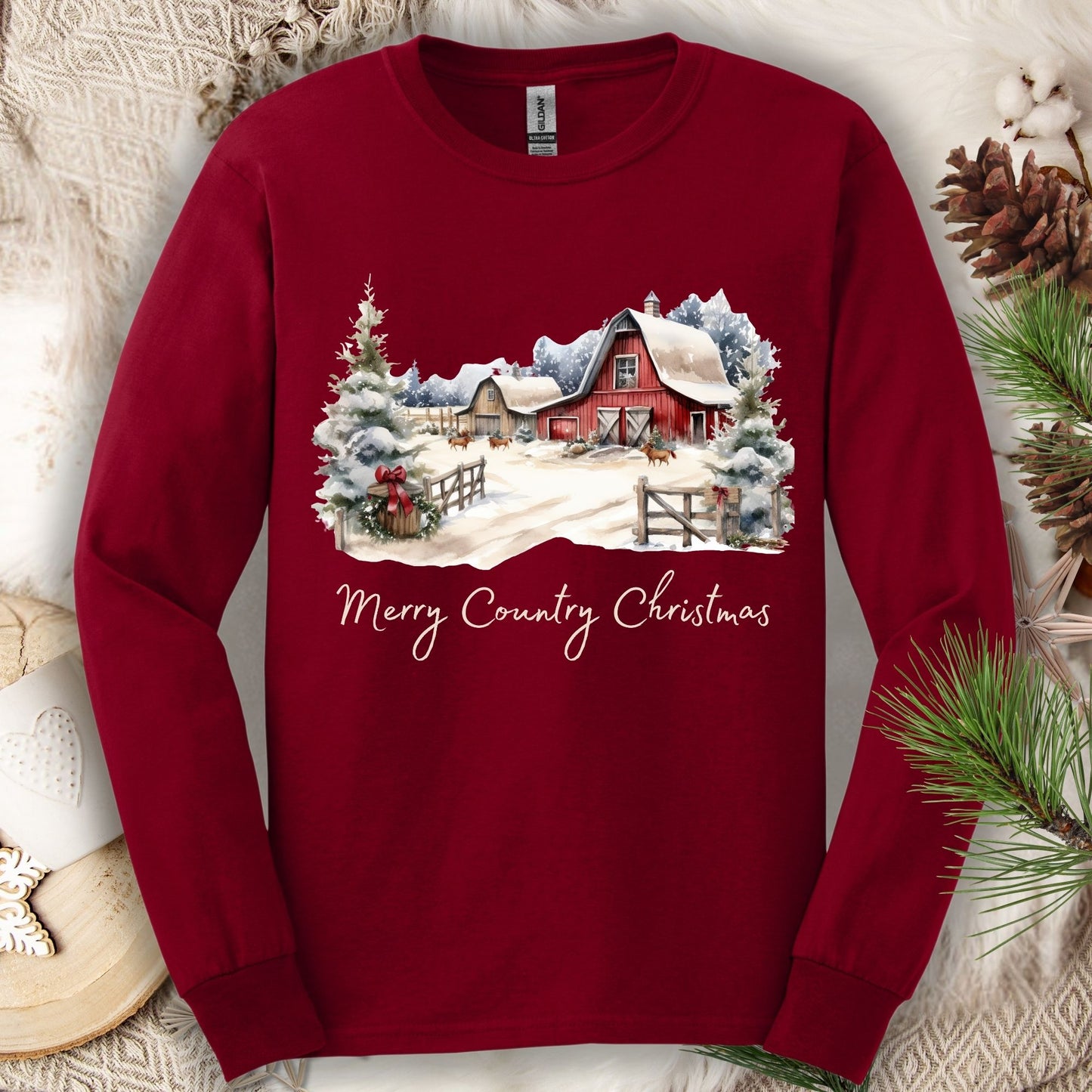 Cardinal Red Gildan long sleeve tee with a snowy red barn and "Merry Country Christmas" text.