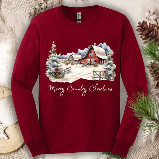 Cardinal Red Gildan long sleeve tee with a snowy red barn and "Merry Country Christmas" text.