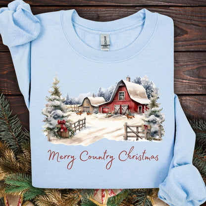 Light blue Gildan sweatshirt with a watercolor country Christmas barn scene and "Merry Country Christmas" text.