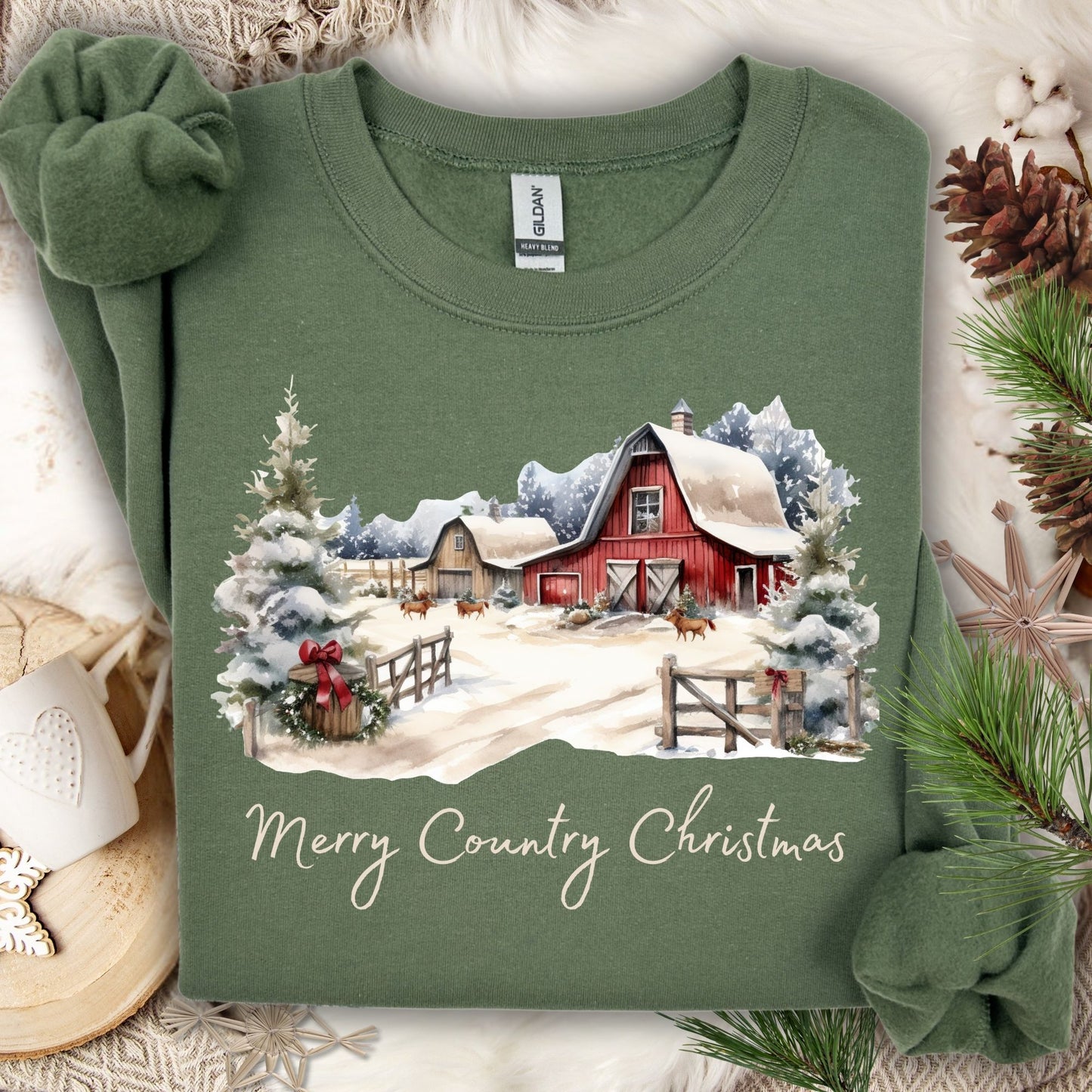 Military Green Gildan sweatshirt with a watercolor country Christmas barn scene and "Merry Country Christmas" text.