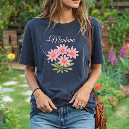 Relaxed-fit, garment-dyed navy t-shirt with a Montana outline and pink bitterroot wildflowers.