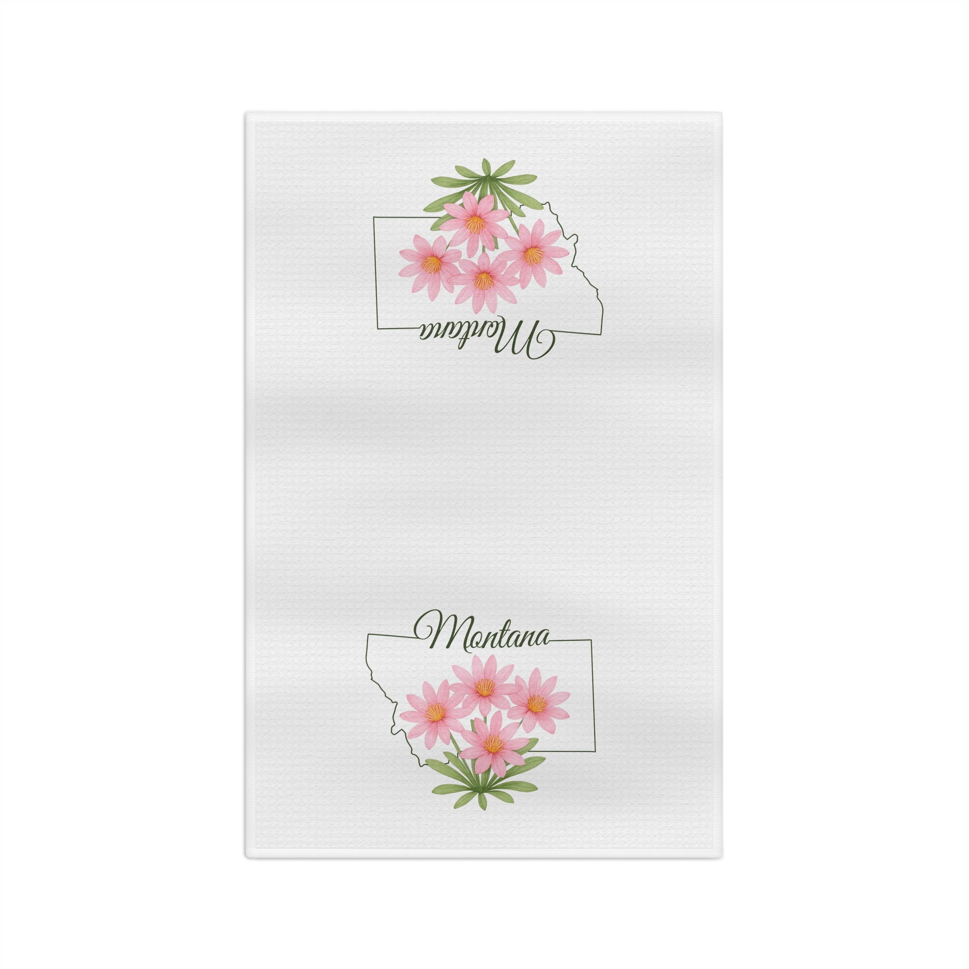 White microfiber tea towel with Montana outline and pink bitterroot flowers.