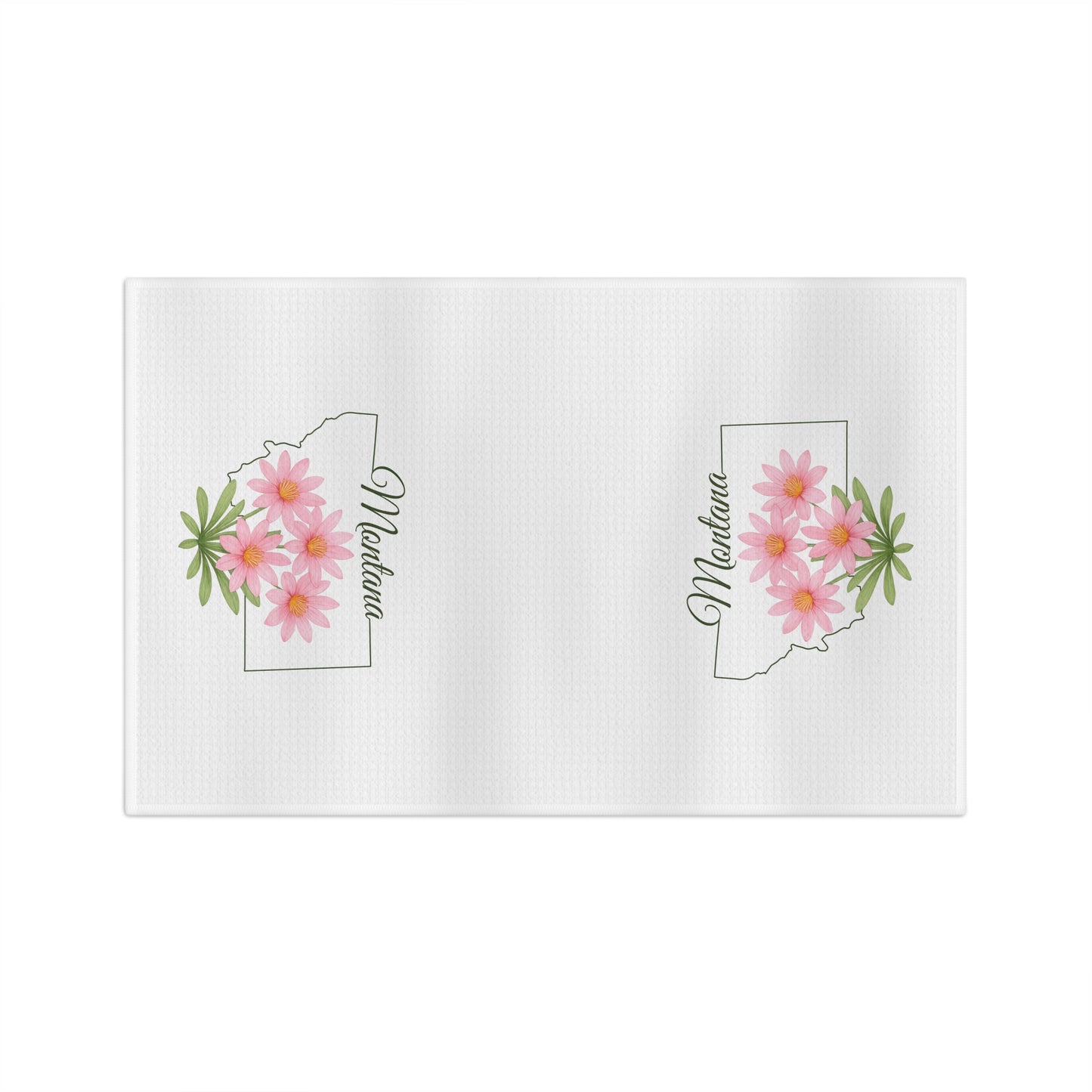 White microfiber tea towel with Montana state outline, pink bitterroot flowers, and "Montana" script.