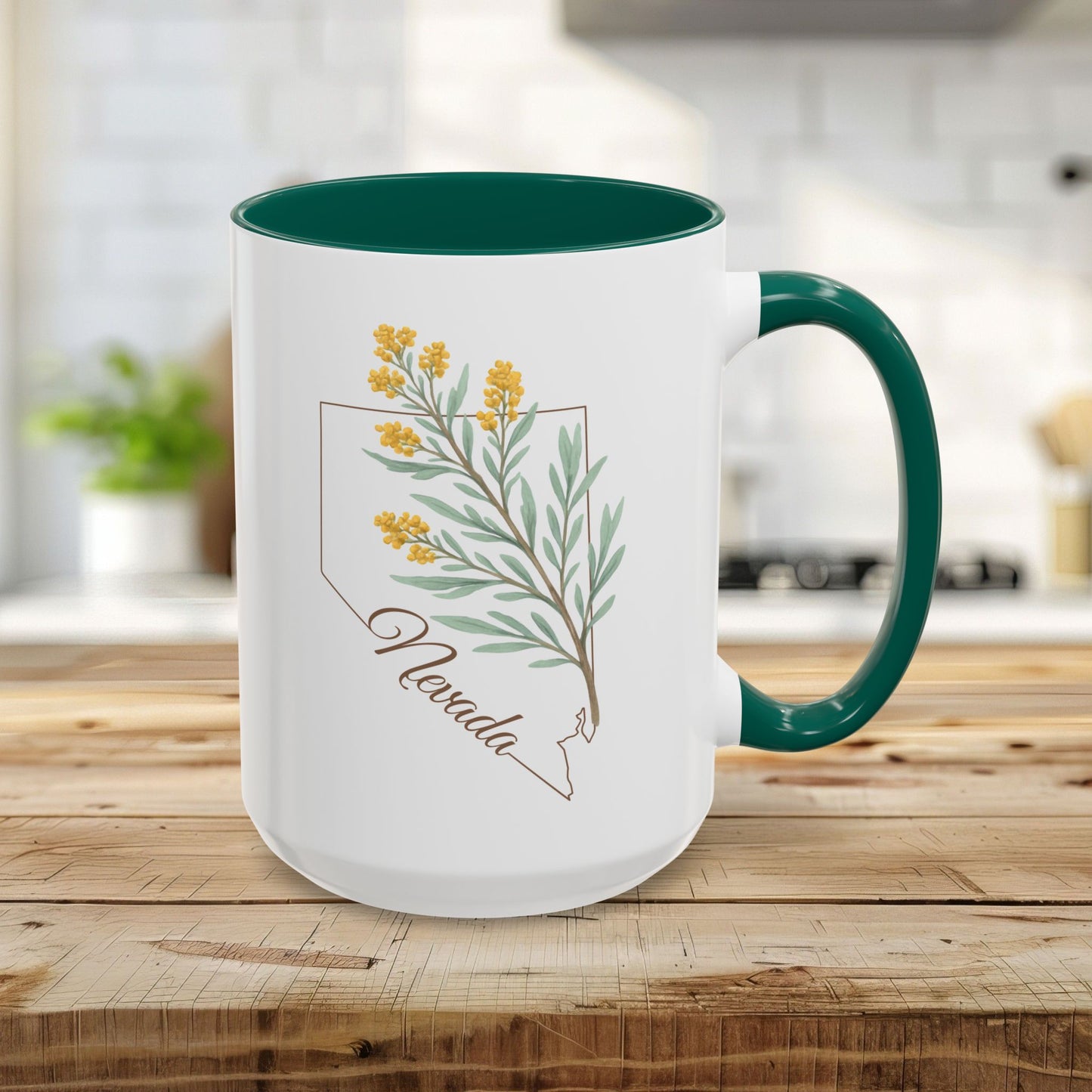 15oz white ceramic mug with green interior and handle, featuring a watercolor Nevada state outline and sagebrush design.
