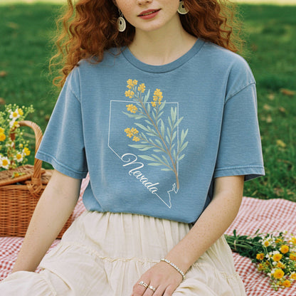 Sagebrush Nevada floral state flower t-shirt in muted blue with a hand-drawn design.