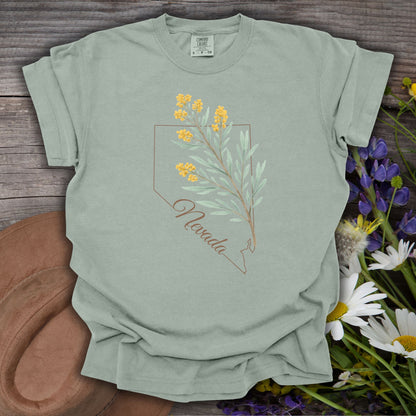 Sagebrush green Nevada floral state flower t-shirt with hand-drawn yellow wildflowers and state outline.