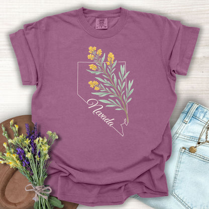 Berry S t-shirt with Nevada state outline and hand-drawn sagebrush floral design.