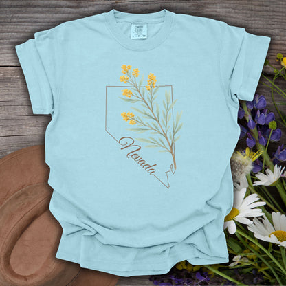 Chambray S t-shirt with Nevada state outline and hand-drawn sagebrush floral design.
