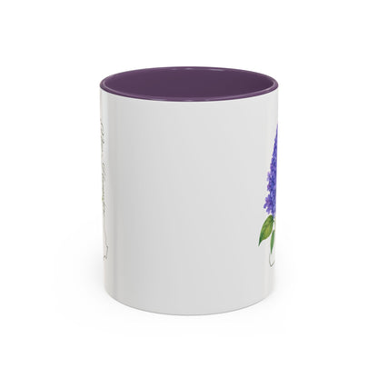 White ceramic mug with a purple interior and handle, featuring a watercolor lilac print and New Hampshire outline.