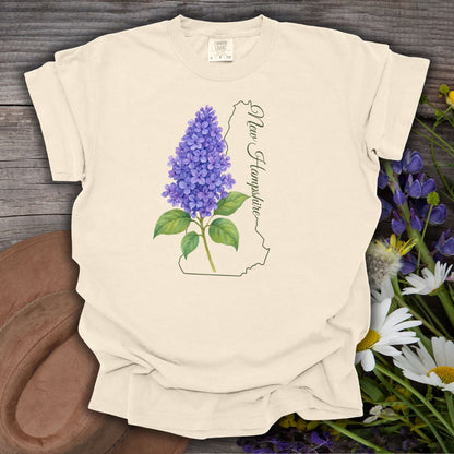 Ivory, relaxed-fit cotton t-shirt with a watercolor lilac sprig, New Hampshire outline, and script.
