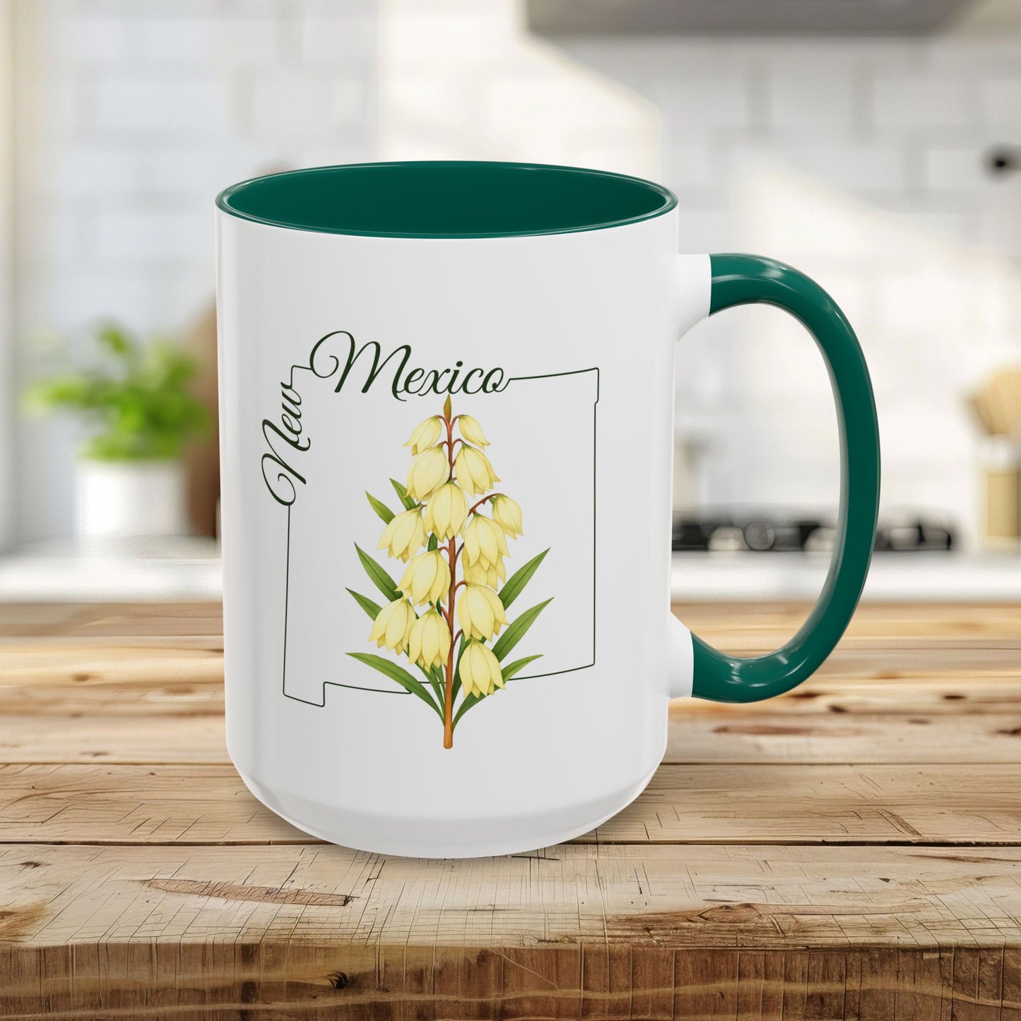 15oz white ceramic mug with green interior and handle, featuring a New Mexico Yucca flower design.
